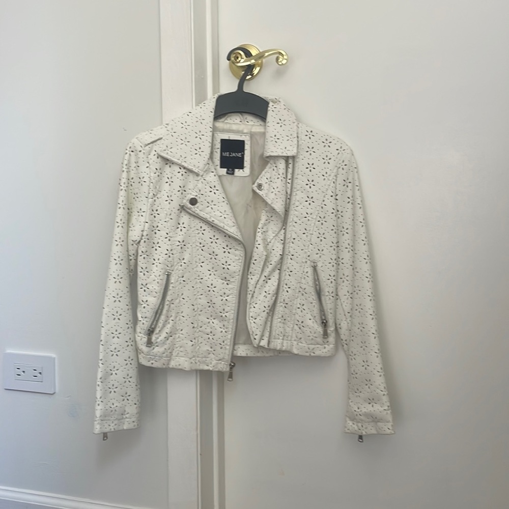 A white leather jacket with cute flower patters